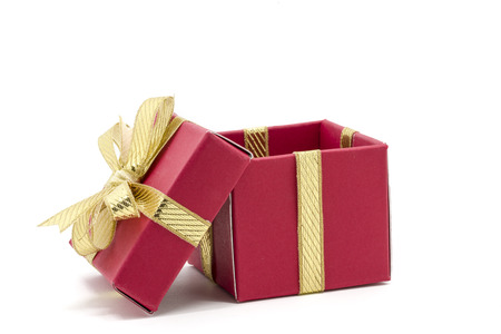 christmas gift box with a gold ribbon bow, isolated on white background