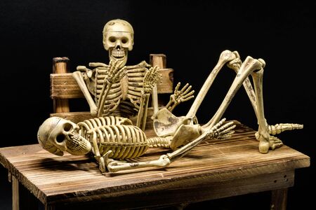 Still life of model skeleton in Halloween concept.