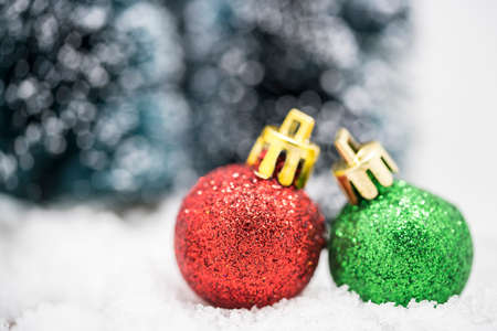 Christmas ornaments on snow.の写真素材