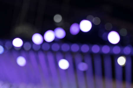 Abstract background with bokeh defocused lights.
