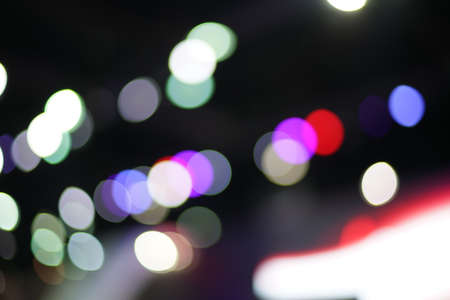 Abstract background with bokeh defocused lights.