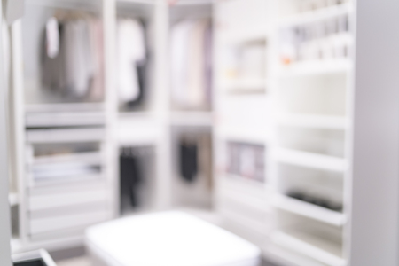 Blurred image of closet room for background uses.の写真素材