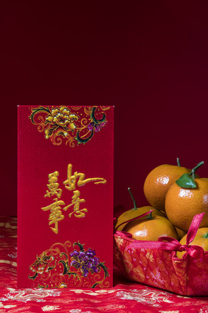 Chinese new year decorations, Orange on red background, Selected Focusの写真素材