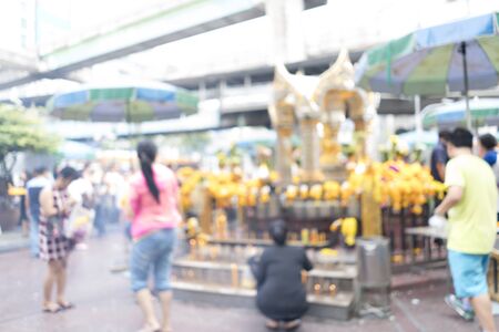 Blurred image of Brahma sculpture at Ratchaprasong, Bangkok, Thailand for background usesの写真素材