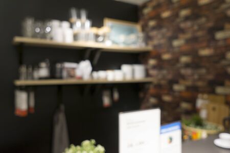 Blurred image of shelf in coffee shop for backgrounds uses.の写真素材