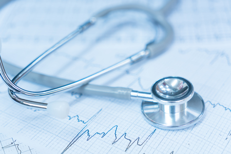 Stethoscope on electrocardiogram.の写真素材