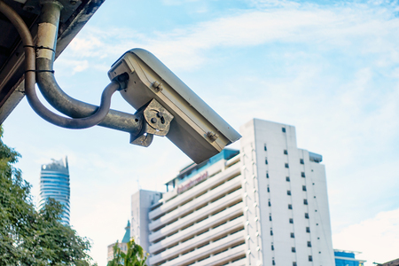 Surveillance Security Camera or CCTV in for protection system under the bridge and blur background...
