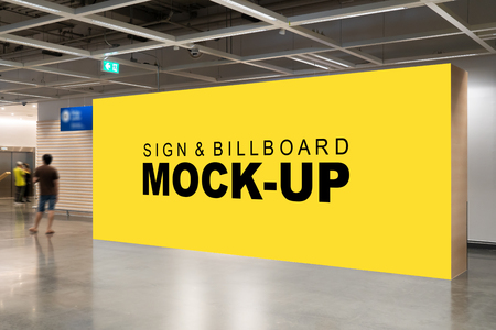 Mock up perspective large horizontal advertising billboard with clipping path on the wall at hallway near elevator, blank yellow screen empty space for in formation advertisementの写真素材