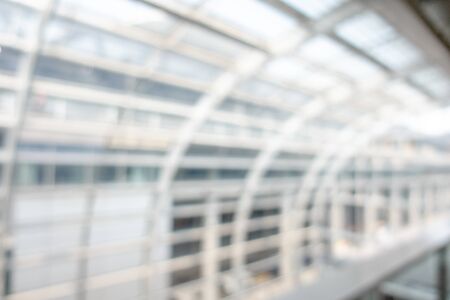 Blurred background image with beautiful architecture of modern airport, nobody at empty area.の写真素材