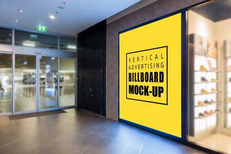 Mock up perspective blank large billboard  on the wall with walkway and entrance automatic door, empty space for insert advertising, information and promotionの写真素材