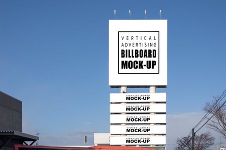 Mock up blank outdoors vertical billboard and five horizontal signboard with clipping path on large pole, Empty space for insert advertising graphic design or text information, signpost or logo nameの写真素材