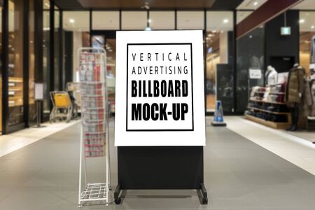 Mock up advertising stand/sandwich board with clipping path on walkway in shopping mall, empty space for insert advertising or announcement informationの写真素材