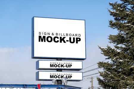 Mock up blank outdoors large billboard on top and horizontal signboard with clipping path on large pole, Empty space for insert advertising graphic design or text information, company name or bannerの写真素材