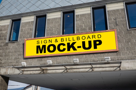 Mock up blank signboard , Outdoor horizontal signboard on panel above entrance to ground floor of  building, Empty space to insert text , advertising or graphic design informationの写真素材