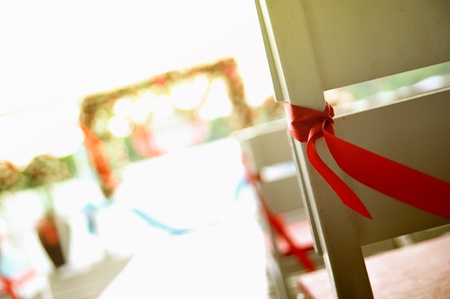 Wedding party ribbon on a chairの写真素材