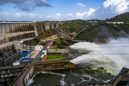 Alqueva, Portugal - February 7, 2026: Water is released from the spillway of the Alqueva Dam in the Alentejo region following Storm Marta. Heavy rainfall increased reservoir levelsのeditorial素材