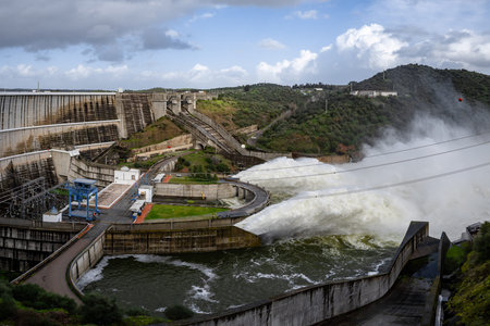 Alqueva, Portugal - February 7, 2026: Water is released from the spillway of the Alqueva Dam in the Alentejo region following Storm Marta. Heavy rainfall increased reservoir levelsのeditorial素材
