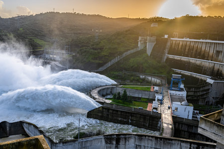 Alqueva, Portugal - February 7, 2026: Water is released from the spillway of the Alqueva Dam in the Alentejo region following Storm Marta. Heavy rainfall increased reservoir levelsのeditorial素材