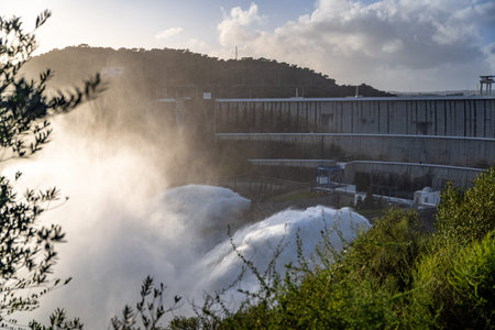Alqueva, Portugal - February 7, 2026: Water is released from the spillway of the Alqueva Dam in the Alentejo region following Storm Marta. Heavy rainfall increased reservoir levelsのeditorial素材