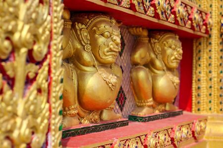 giant stucco art that is carrying something in terms of Buddhism. can be found at most temples in Thailandのeditorial素材