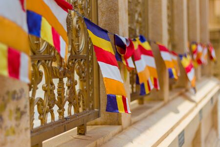 Buddhist flag is commonly used internationally is called. Bunting Began to appear to be used from the beginning of the 25th Buddhist century or the late 19th century.の写真素材