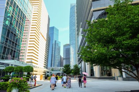 Singapore - July 28, 2019 - The Merlion Statue fountain with the City Skyline, Marina Bay, And other...