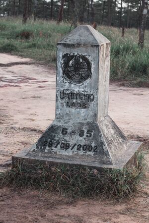 The pillar divides the border between Thailand and Laos Location at Phu Soi Dao National Park Tambon Huai Mun, Amphoe Nam Pat, Uttaradit, Thailand September 15, 2018のeditorial素材