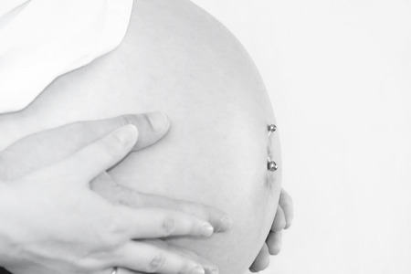 hands on pregnancy bellyの写真素材