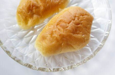 mini bread on white background