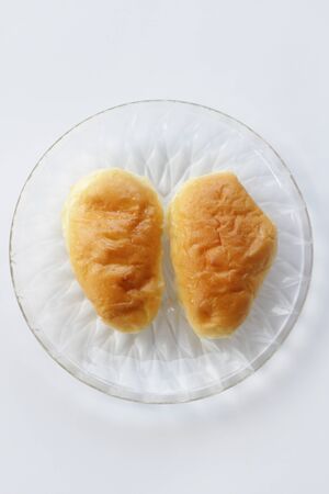 mini bread on white background