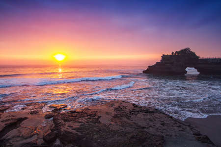 Silhouette hindu temple Pura Tanah Lot and sunset Bali, Indonesia.の写真素材