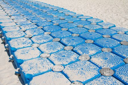 Plastic pontoon on the riverの写真素材