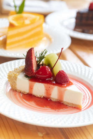 A piece of fresh fruit cream cheese pie.