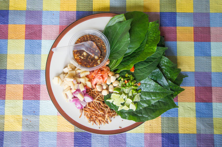 Savoury Leaf Wrapsà¸¡ Miang khamの写真素材