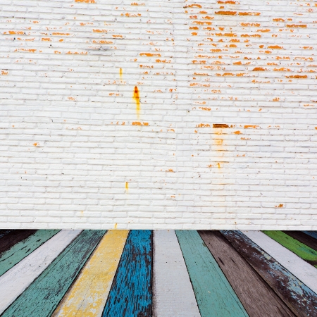 White brick wall with wooden floorの写真素材