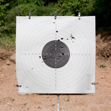 Holes in a shooting practice target.の写真素材