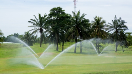 Watering in golf courseの写真素材