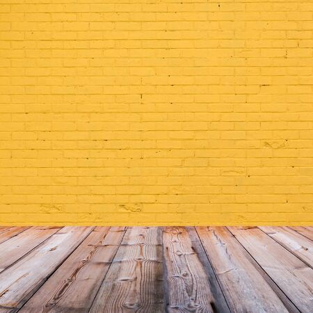 room interior with yellow brick wall  backgroundの写真素材