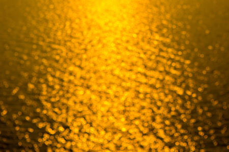gold bokeh backgroundの写真素材