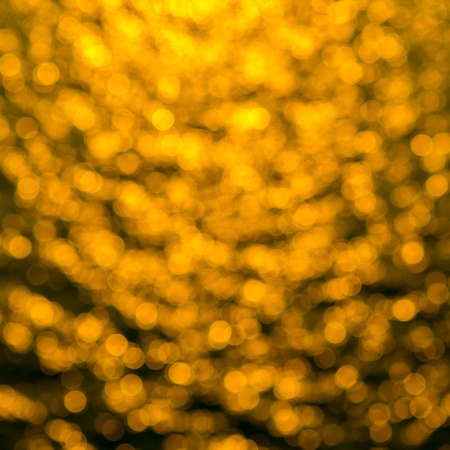 gold bokeh backgroundの写真素材
