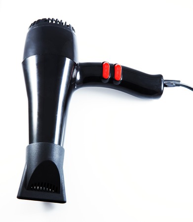 black Hair dryer isolated on whiteの写真素材
