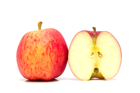 Red apple  and slice on a white background.の写真素材
