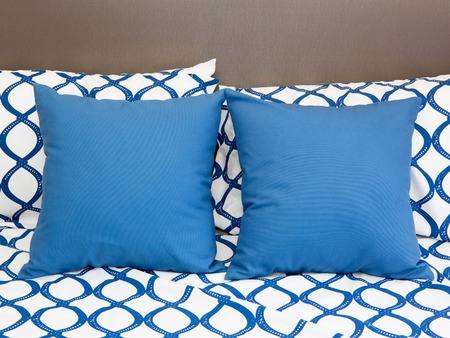 pillows on a bedの写真素材