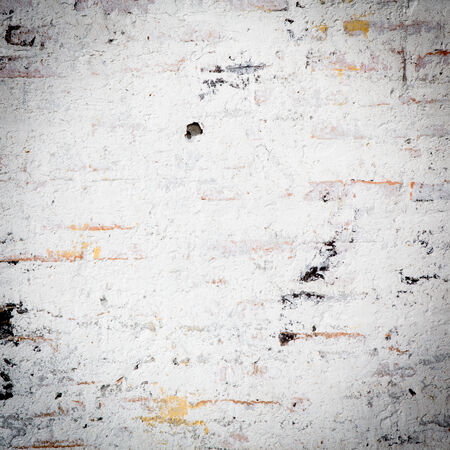 White grunge brick wall backgroundの写真素材