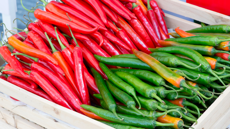 Chili Peppers in basketの写真素材
