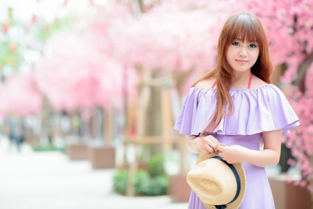 Beautiful asian girl in parkの写真素材