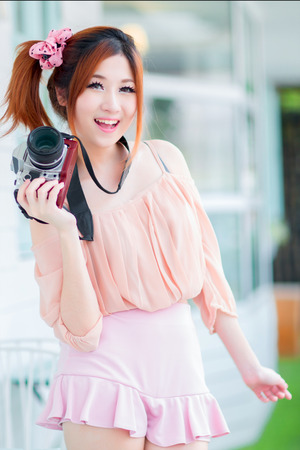 Beautiful asian girl in parkの写真素材