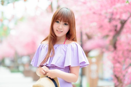Beautiful asian girl in parkの写真素材