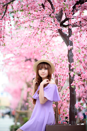 Beautiful asian girl in parkの写真素材