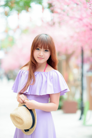 Beautiful asian girl in parkの写真素材